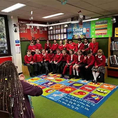 Kids listening to the teacher