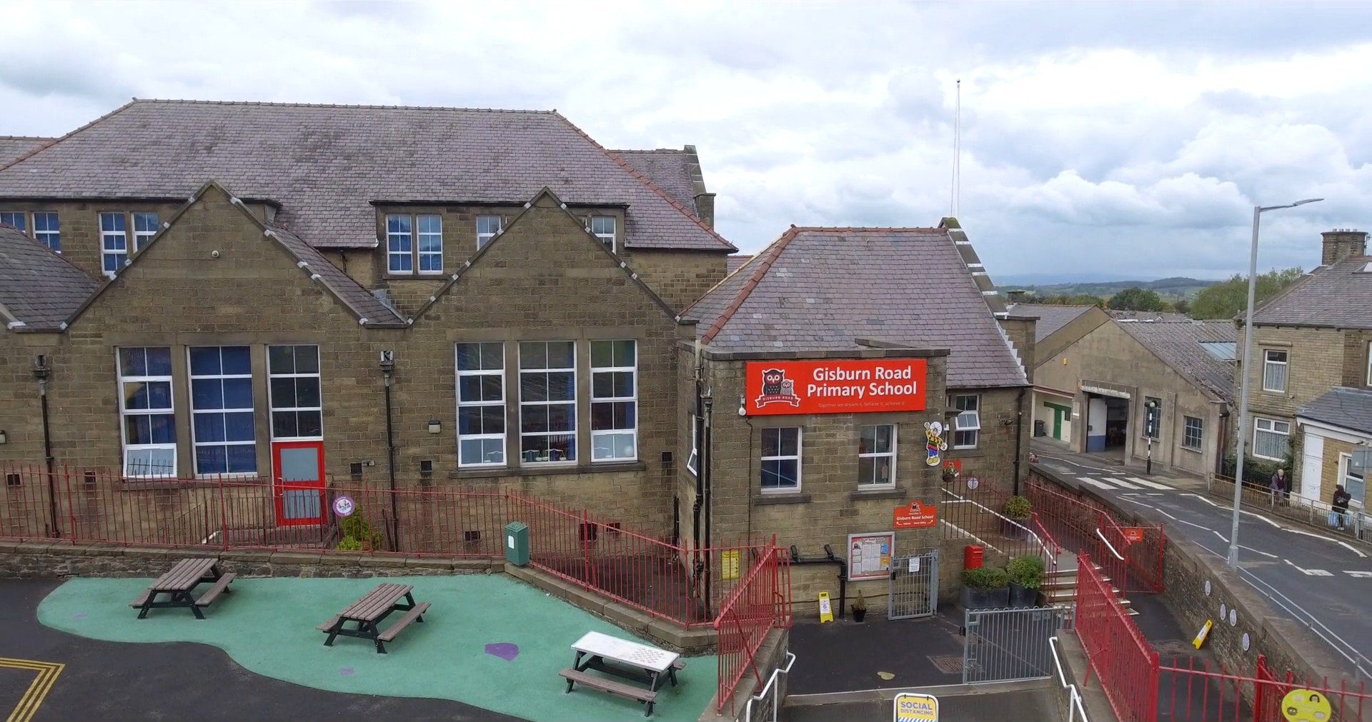 drone photo main entrance and sign